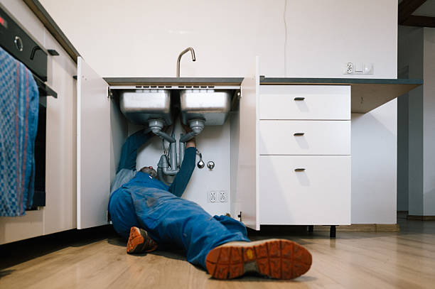 Professional Drain Cleaning technician working in Greenville, DE